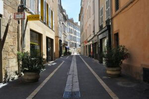 Charming street in Aix-en-Provence, Provence, with historic architecture, local cafés, and classic French old town atmosphere.