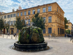The Mossy Fountain (Hot Water Fountain) in Aix-en-Provence on Cours Mirabeau, one of the most famous fountains in Provence, South of France.